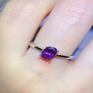 1 carat moissanite solitaire ring with a classic four-prong setting and brilliant sparkling gemstone.