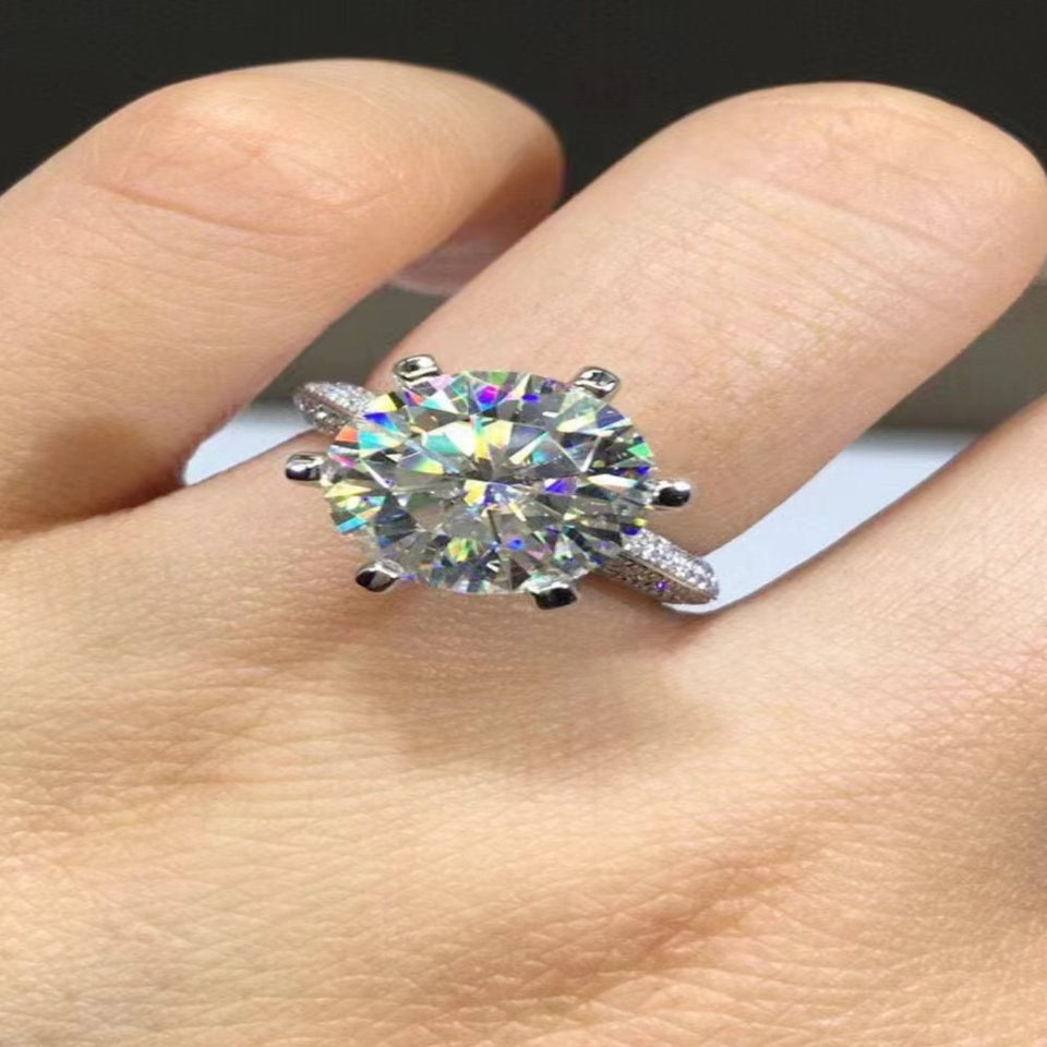 5 carat moissanite ring featuring a secure six-prong setting with a brilliant sparkling gemstone.