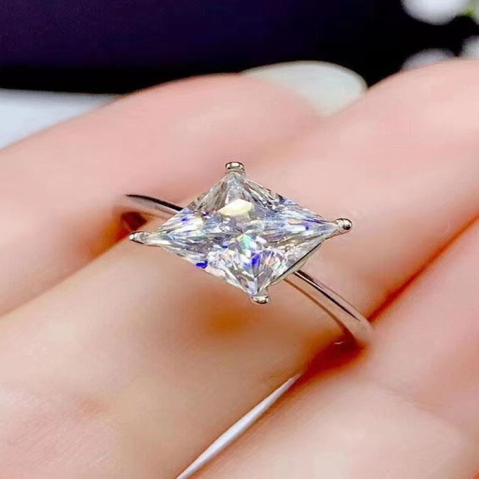 5 carat moissanite solitaire ring with a brilliant sparkling gemstone.