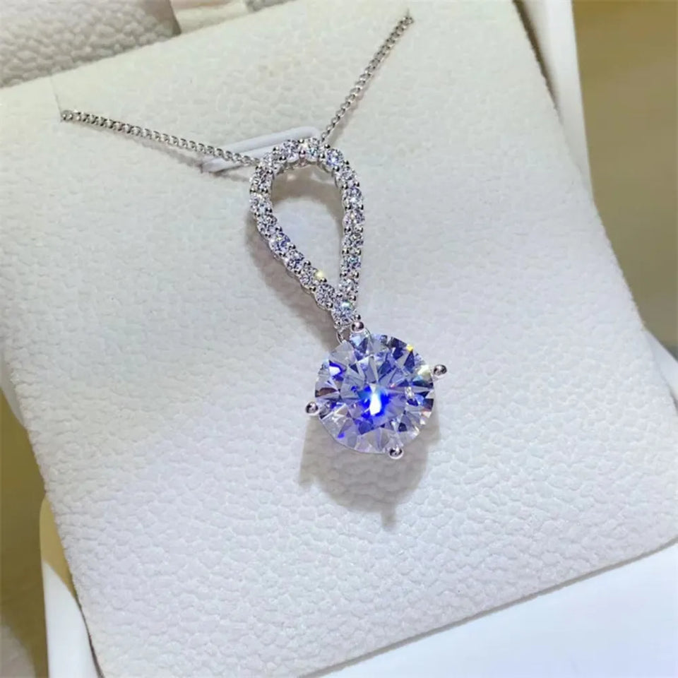 5 carat teardrop moissanite necklace crafted in 925 sterling silver with a brilliant sparkling gemstone.
