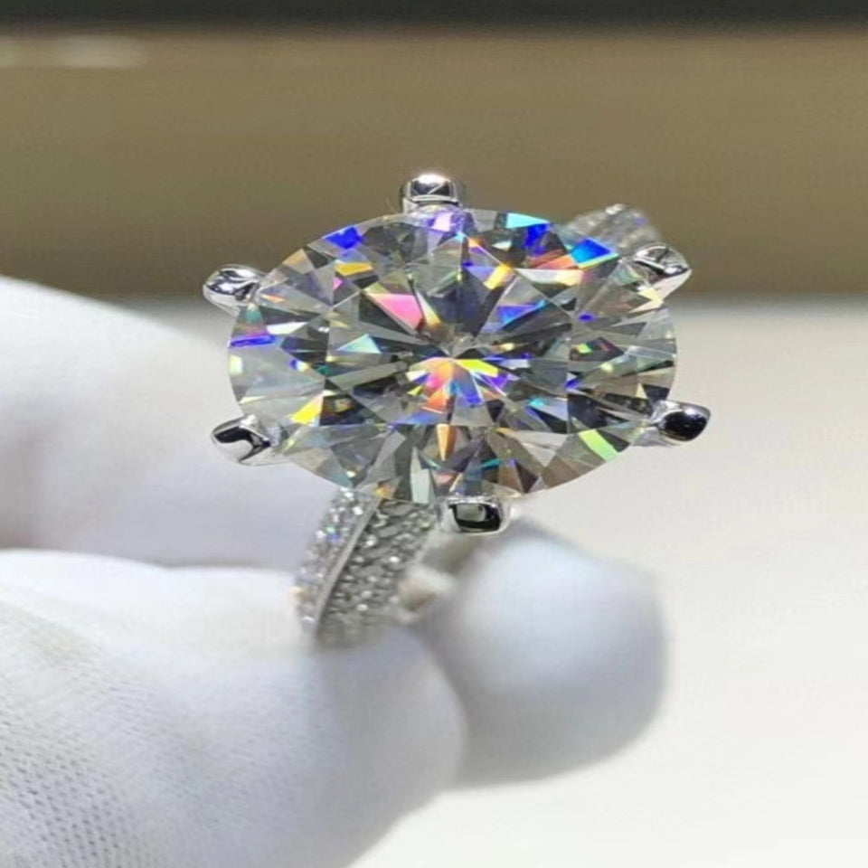 5 carat moissanite ring featuring a secure six-prong setting with a brilliant sparkling gemstone.