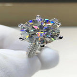 5 carat moissanite ring featuring a secure six-prong setting with a brilliant sparkling gemstone.