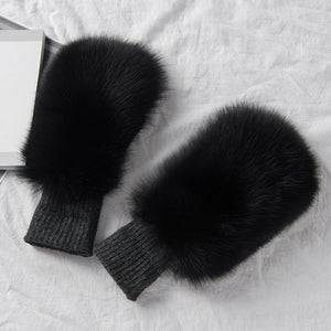 Women's warm fox skin winter gloves in soft gray faux fur.