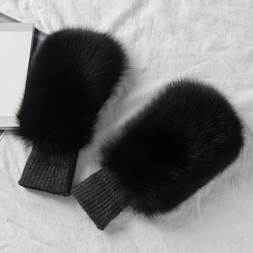 Women's warm fox skin winter gloves in soft gray faux fur.