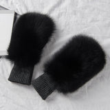 Women's warm fox skin winter gloves in soft gray faux fur.