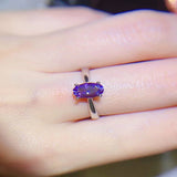 1 carat moissanite solitaire ring with a classic four-prong setting and brilliant sparkling gemstone.