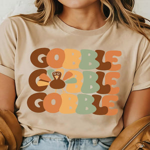 Women's GOBBLE turkey Thanksgiving graphic round neck T-shirt.
