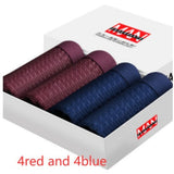Four-pack men's boxer briefs in assorted colors.